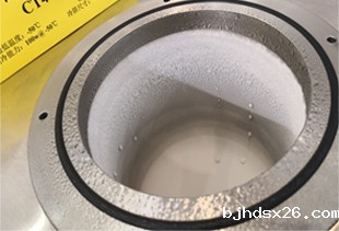 低温冷阱解冻除霜的方式